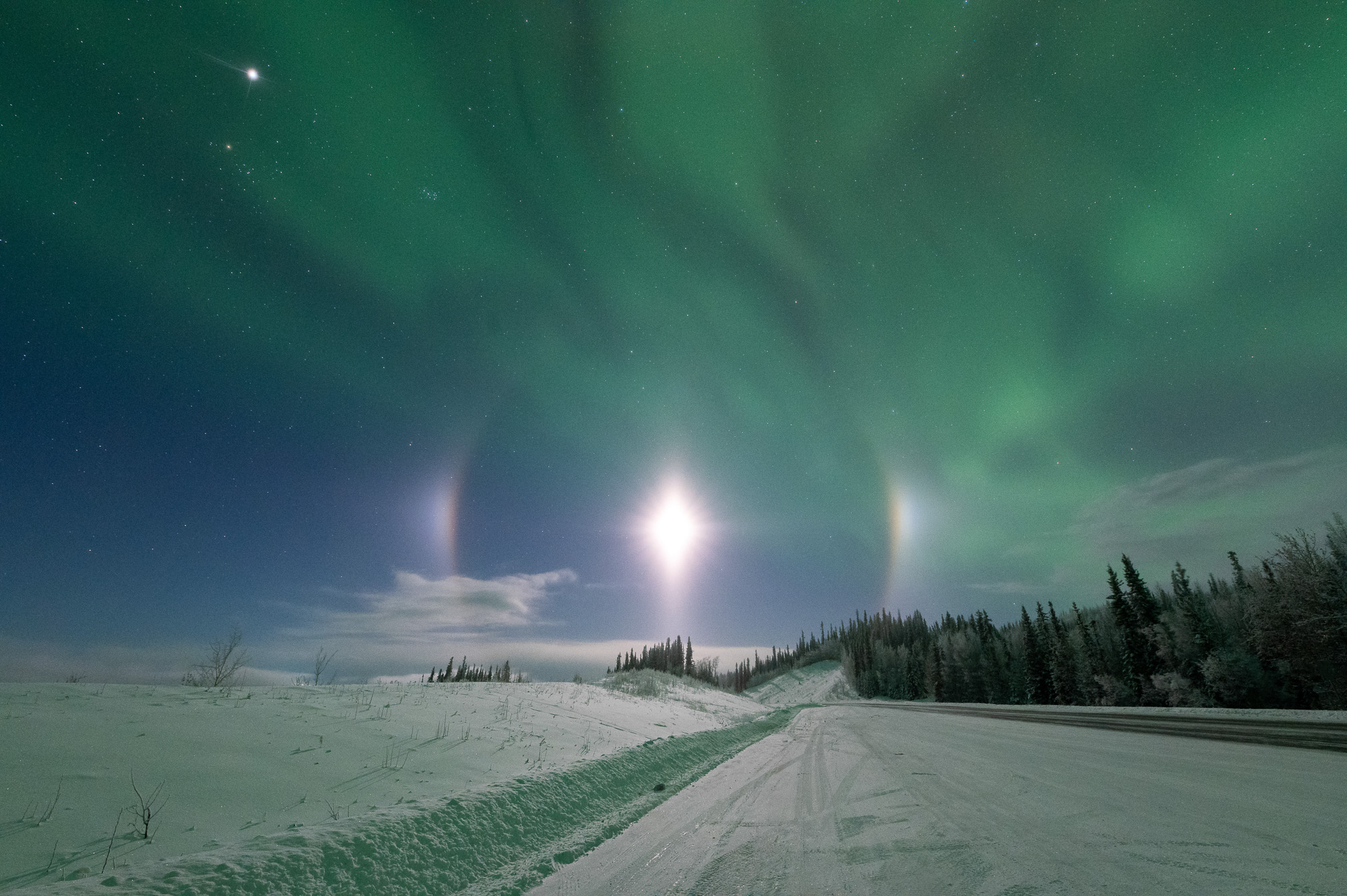 Aurora and a moon halo in Alaska